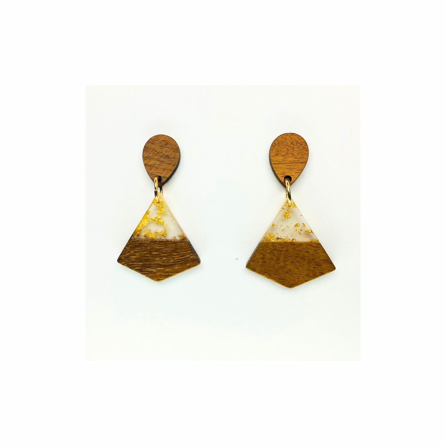Boho Wood Collection Stud Triangle Earrings with Unique Gold and White Accents on Wooden Design