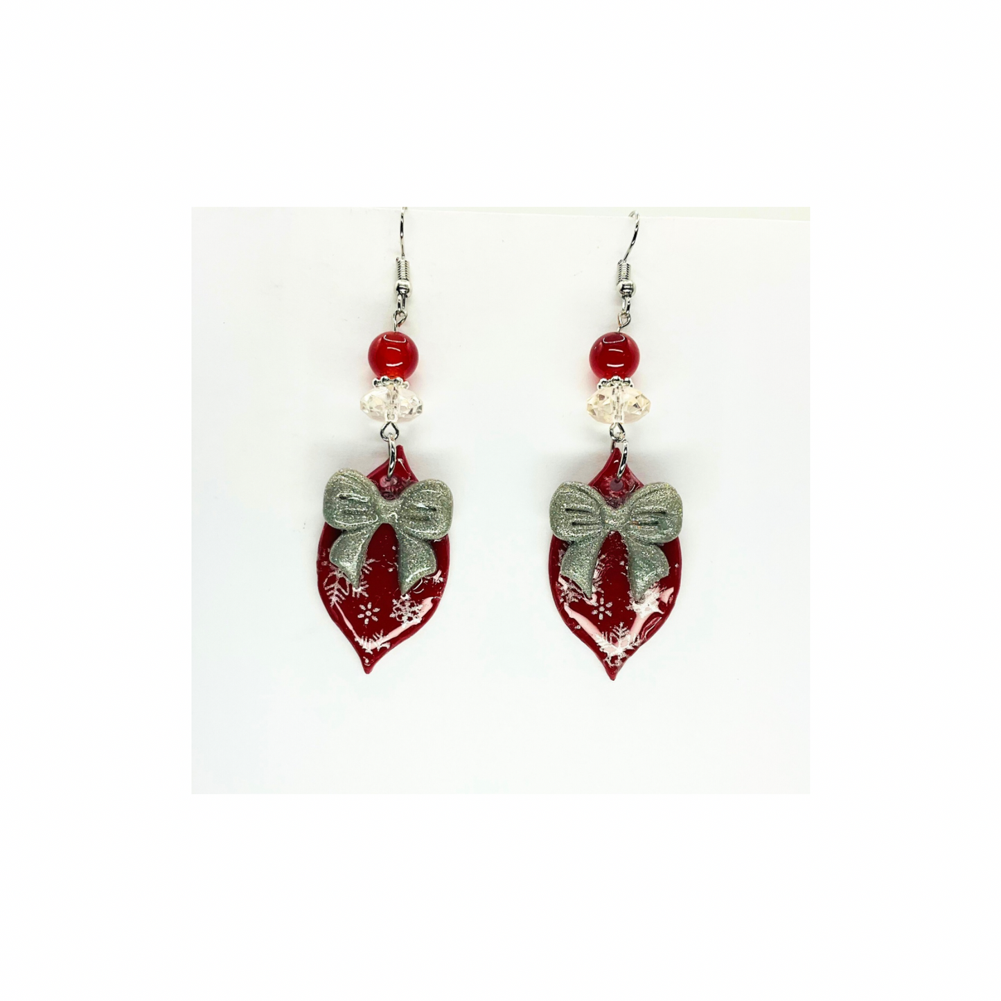 Red Ornament with Silver Bow Embellished with Beads Dangle Earring for Festive Wear