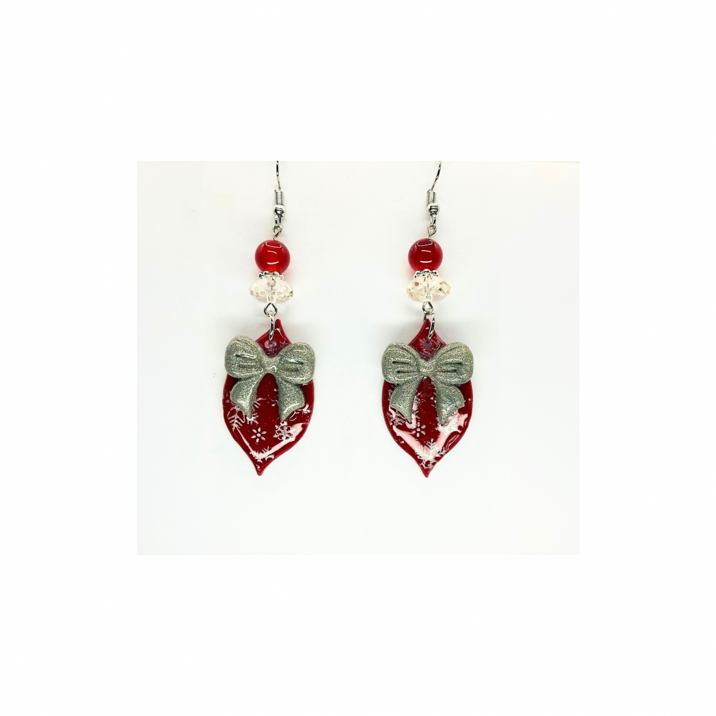 Red Ornament with Silver Bow Embellished with Beads Dangle Earring for Festive Wear
