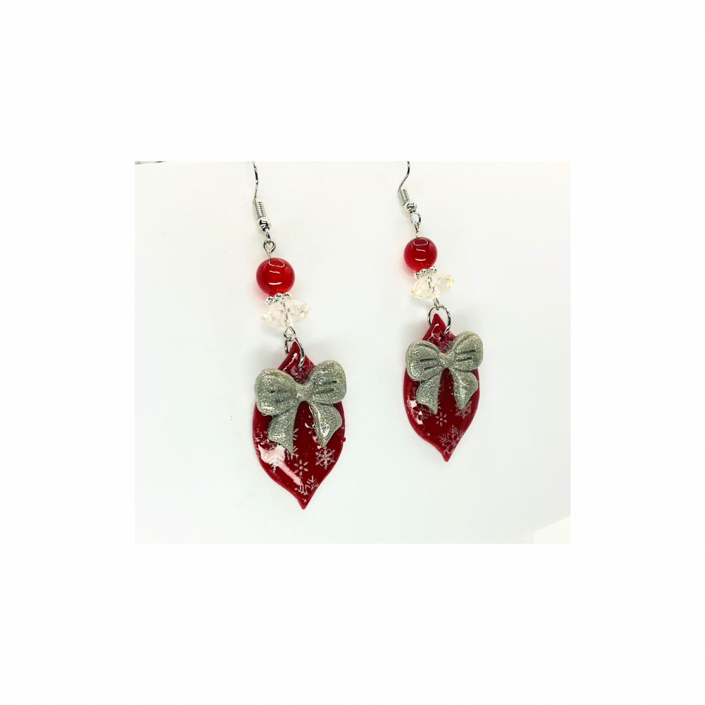 Red Ornament with Silver Bow Embellished with Beads Dangle Earring for Festive Wear