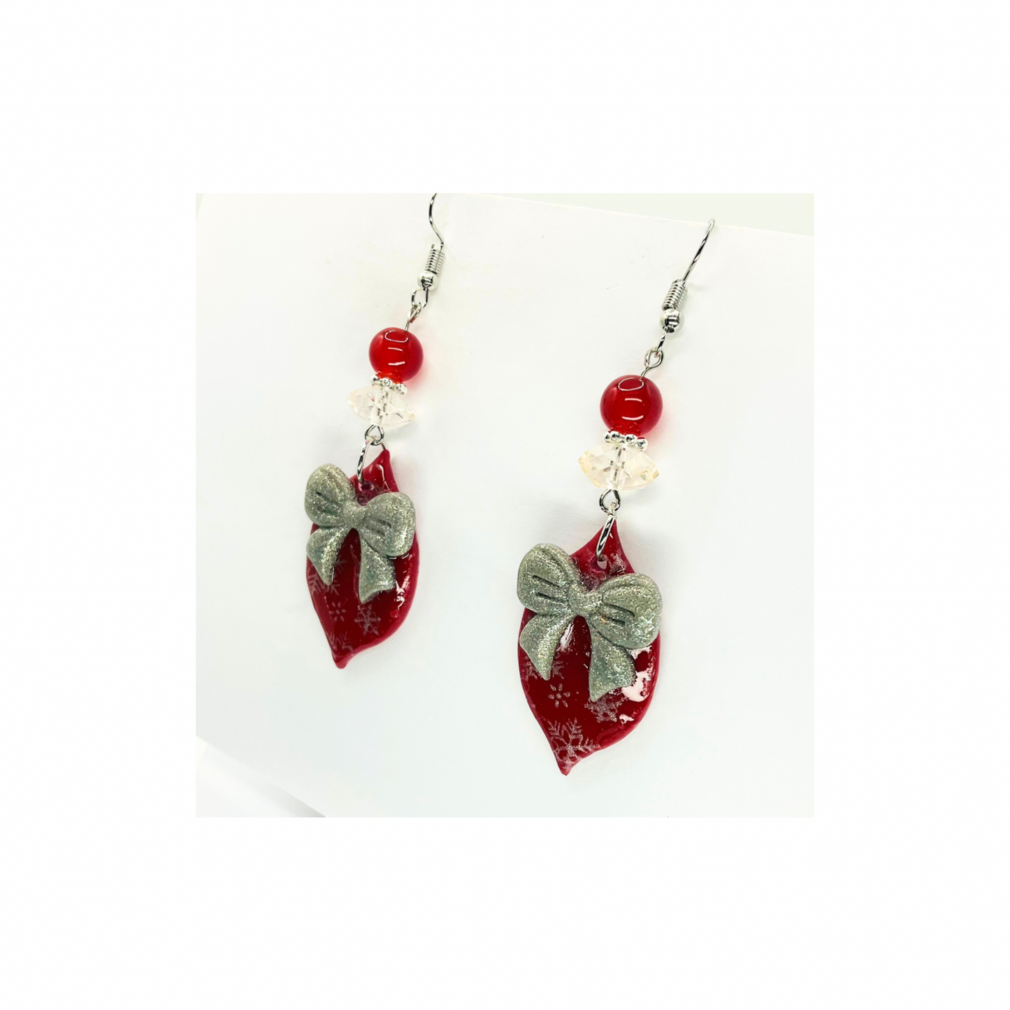 Red Ornament with Silver Bow Embellished with Beads Dangle Earring for Festive Wear